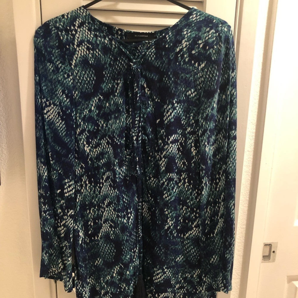 Long sleeve stylish dress in size medium.